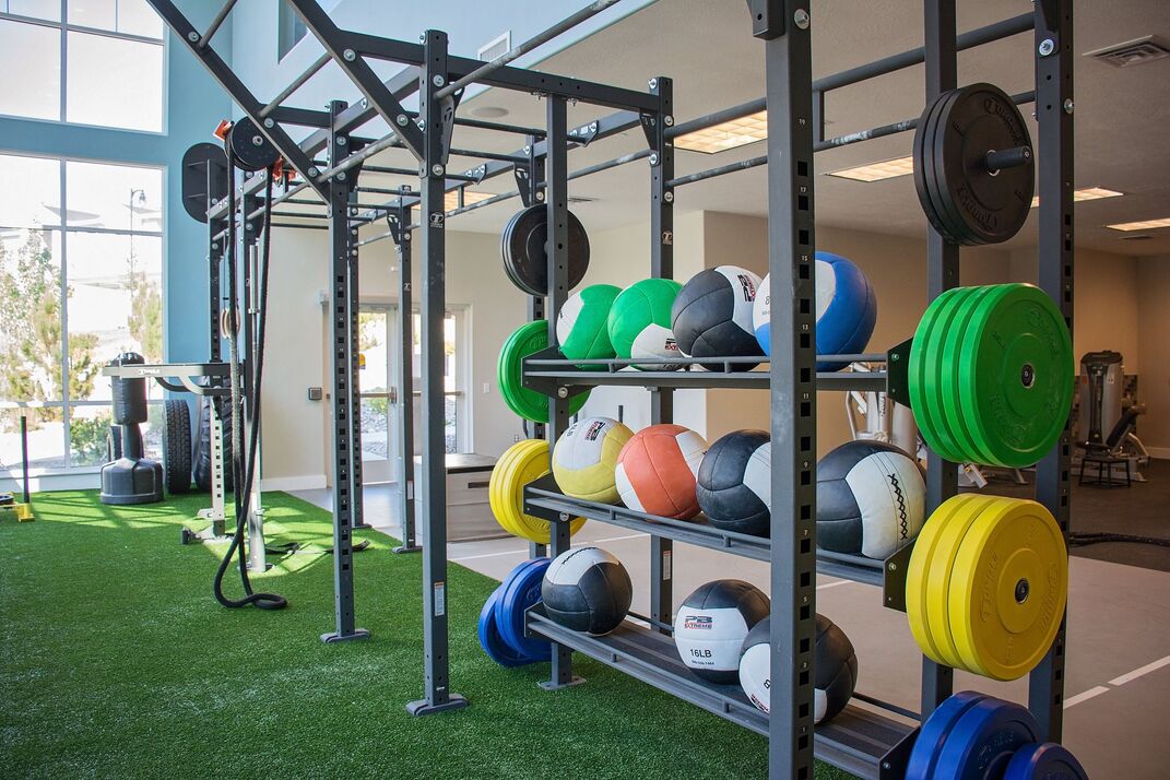 Fitness center with functional training equipment