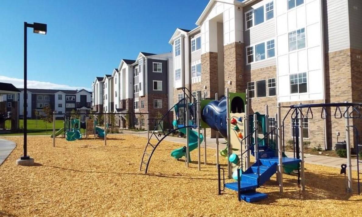 Playground with climbing, slides, and swings